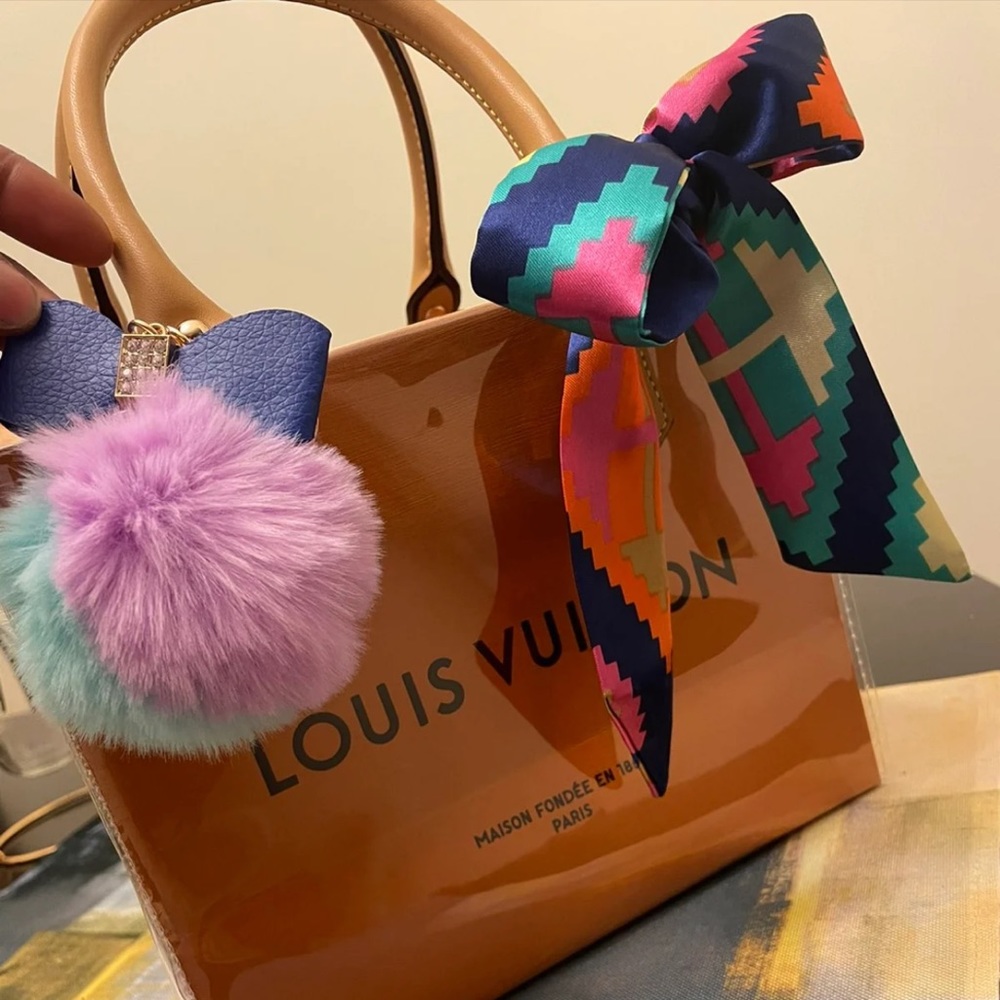 authentic lv shopping bag with cover over it
